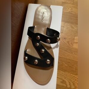 also black sandals with silver accent